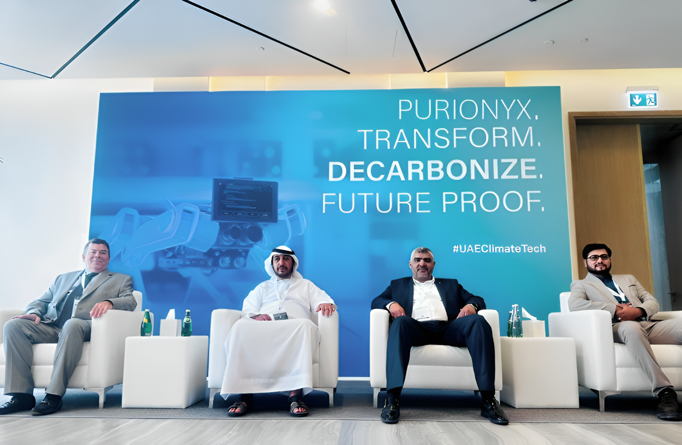 A group of men sitting in chairs AI-generated content may be incorrect.